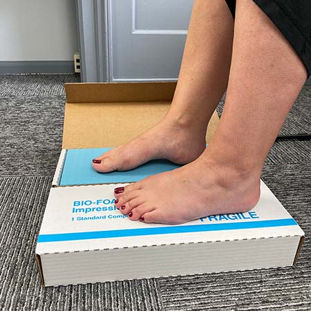 patients foot on BIO-FOAM Impression Foam kit